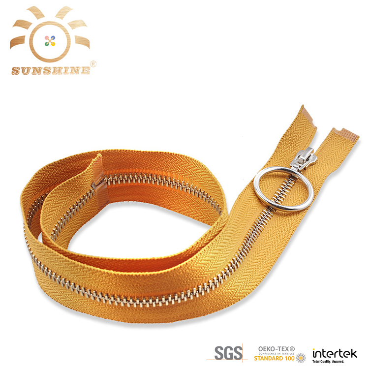 Yellow metal zippers sell