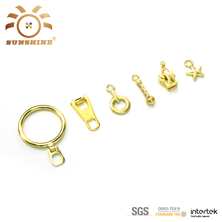 Golden metal zipper pullers