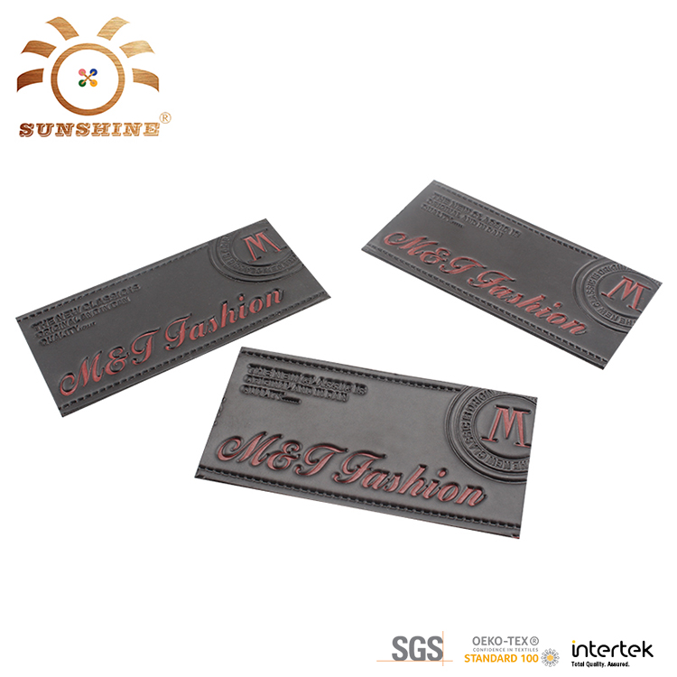 Custom PU leather label with embossed logo